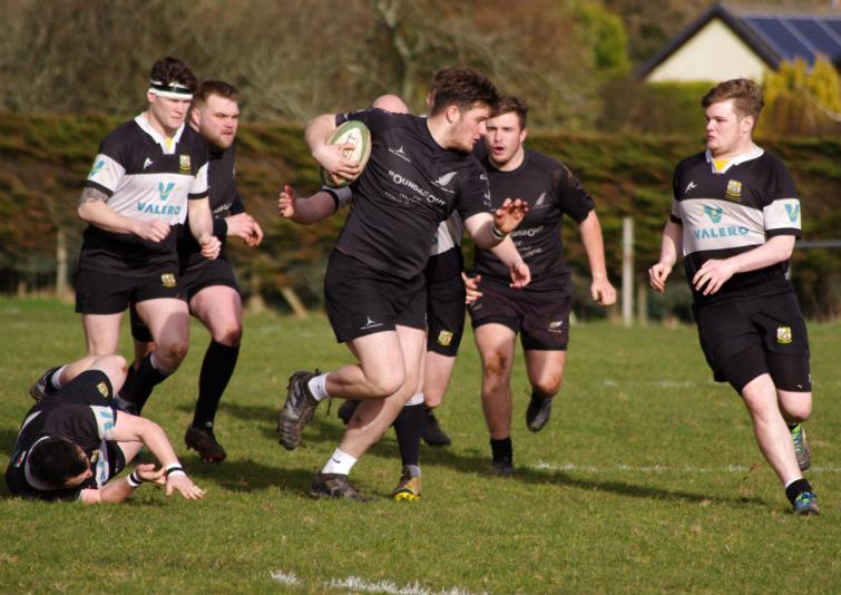 Scott Buirds powers forward for Neyland against The Quins